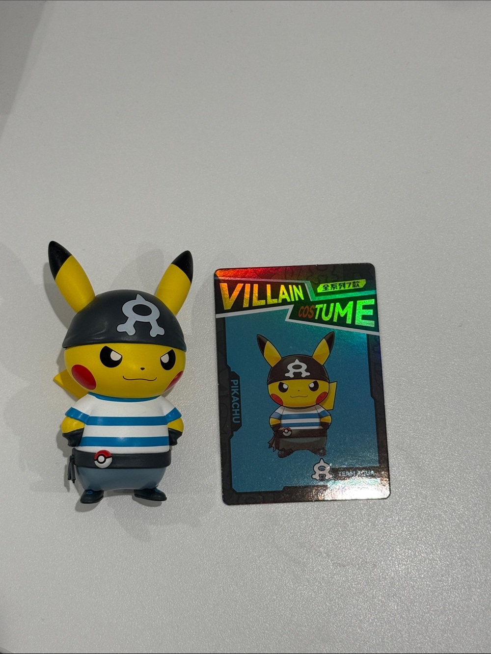 Pokemon Pikachu Villain Costume Figure with Blue & White Striped Shirt